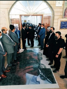 صورة مهينة لصدام حسين في مجلس عزاء قاض حاكمه