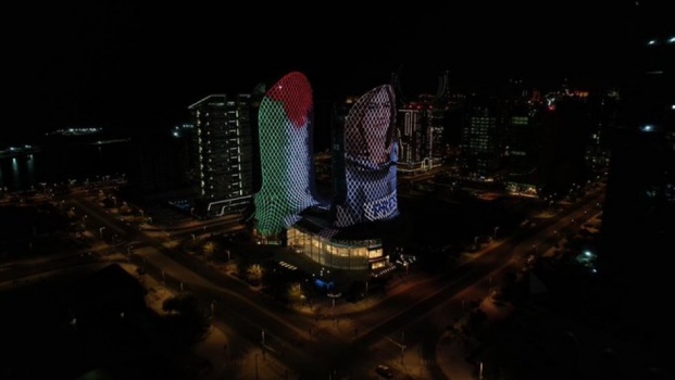 أبراج الدوحة تتوشح بعلم فلسطين وصورة شيرين أبو عاقلة