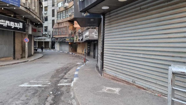 إضراب شامل يعم محافظات الضفة بعد مجزرة "المعمداني"
