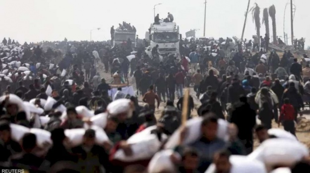 خلال انتظار المساعدات.. شهداء ومصابون بمجزرة مفترق الكويت بمدينة غزة