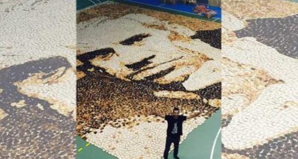 فنان فلسطيني يدخل موسوعة «غينيس» بلوحة من الخبز المحمّص