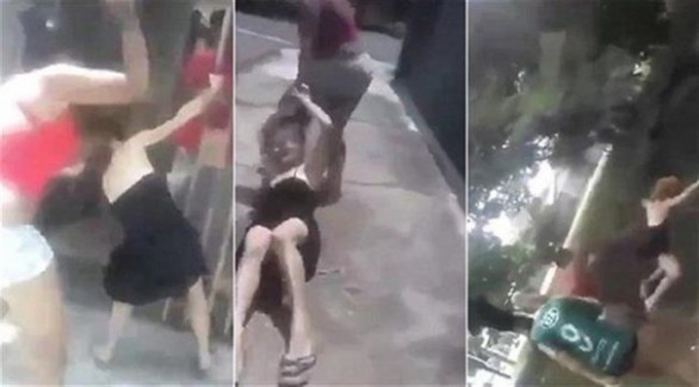 فيديو : زوجة غيورة ترمي عشيقة زوجها من فوق الجسر !
