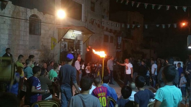 بالصور..أيقاد شعلة العهد والوفاء للاسرى والشهداء في جنين
