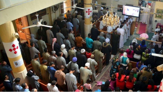 300 مسلح يعرون قبطية ويطوفون بها بسبب علاقة بين ابنها ومسلمة