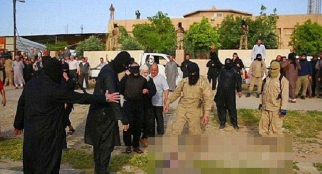 "داعش" ينشر صورا لإعدام 7 من عناصره غليا بالماء