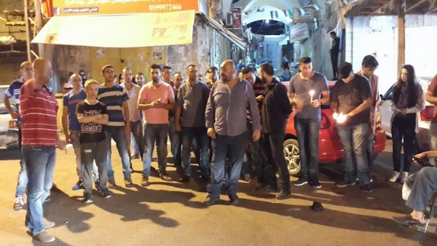إضاءة شموع ووقفة تضامنية مع الأسير كايد في جنين