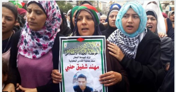 الاحتلال يستدعي والدة الشهيد مهند الحلبي للتحقيق غدا