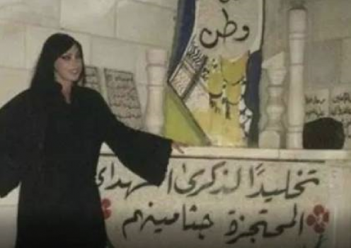 عاهرة إسرائيلية تلتقط صورا عند أضرحة شهداء بفلسطين (صور)