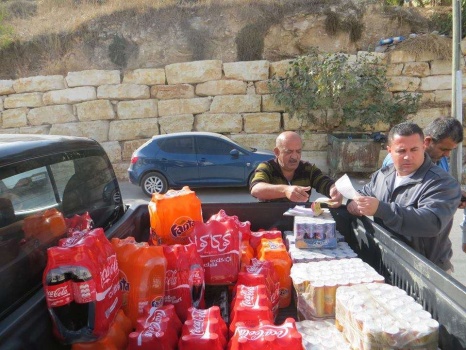 بالصور..مصادرة مشروبات غازية وعصائر لتعرضها لأشعة الشمس في جنين