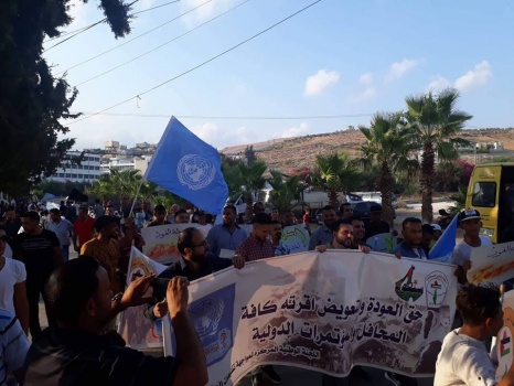طوباس:وقفة احتجاجية في مخيم الفارعة ضد تقليصات "الأونروا"