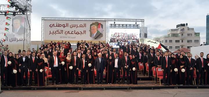بالصور..بحضور الرئيس..عرس وطني جماعي لمئات العرسان في رام الله