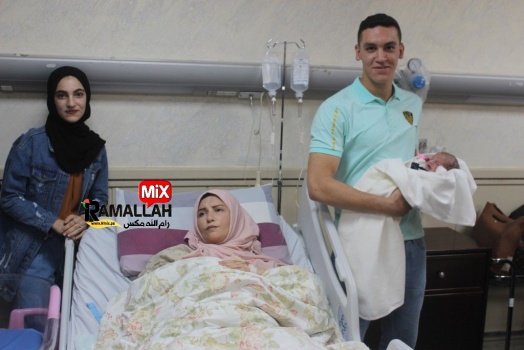 بالصور..زوجة أسير من بلدة السيلة الحارثية غرب جنين تنجب طفلاً عبر تهريب نطفه من السجون « الإسرائيلية »