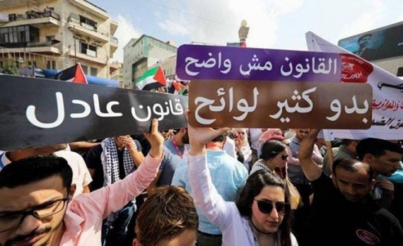 قانون الضمان..الحكومة تصر على تطبيقه والحراك يصعد