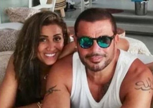 فيديو: عمرو دياب يقبل دينا الشربيني على المسرح ويصرح بحبها علنا
