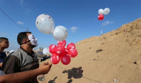 هاتفيًا: الاحتلال يهدد باغتيال مطلقي البالونات