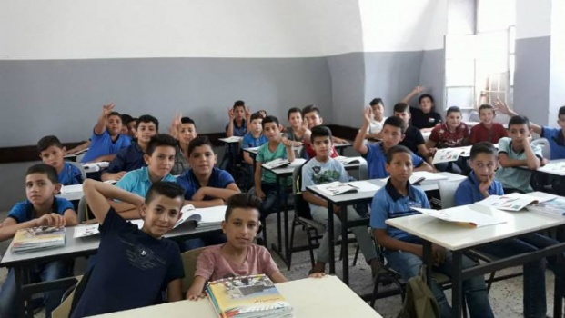 التربية تؤكد التزامها بخلو مدارسها من بضائع الاحتلال