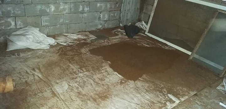 صور...ضبط معمل لتصنيع وتعبئة الدخان والمعسل بالخليل
