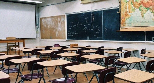 الأطفال الصينيون يصنعون قبعات لمكافحة فيروس كورونا...صور