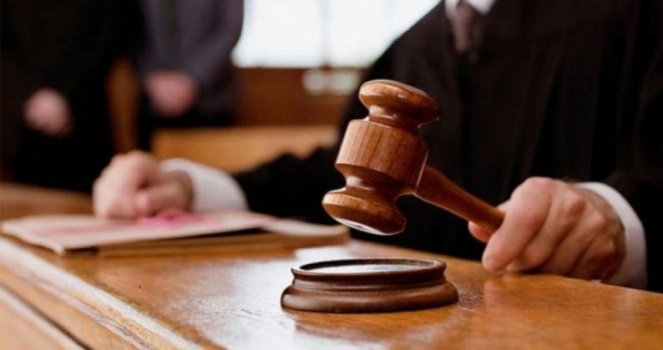 الأشغال الشاقة ثلاث سنوات لمدان بتهمة التدخل في تداول أوراق مزورة