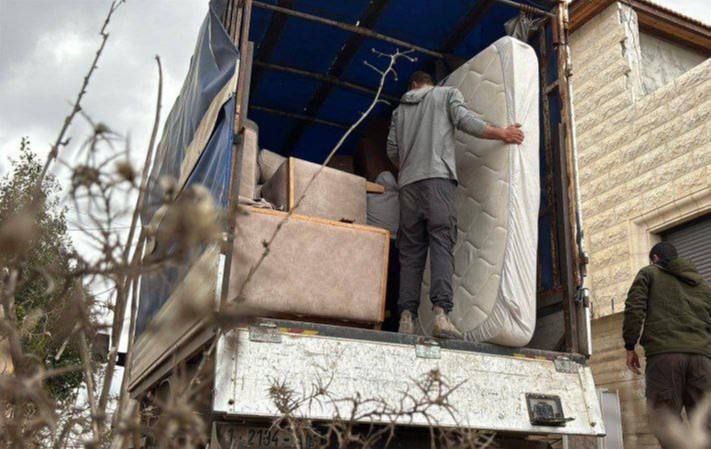6  عائلات تخلي منازلها تمهيدا لهدمها في مدينة نابلس