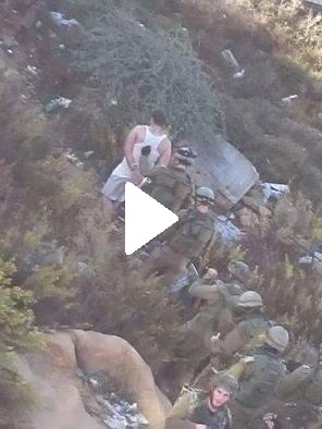 صور وفيديو : اعتقال شاب من جنين وتجريده من ملابسه في حي البالوع شمال البيرة