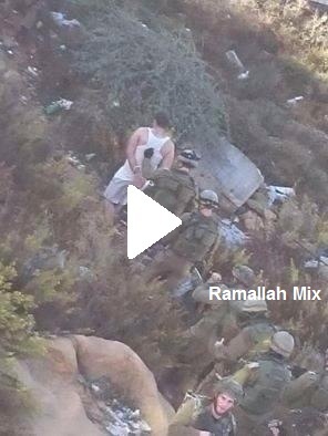 صور وفيديو : اعتقال شاب من جنين وتجريده من ملابسه في حي البالوع شمال البيرة