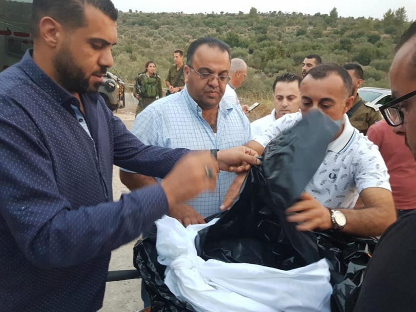 بالصور..الاحتلال يسلم جثمان الشهيد الريماوي